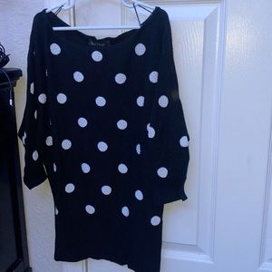 I’m selling a sweater that is all black with white poke a dots barely worn